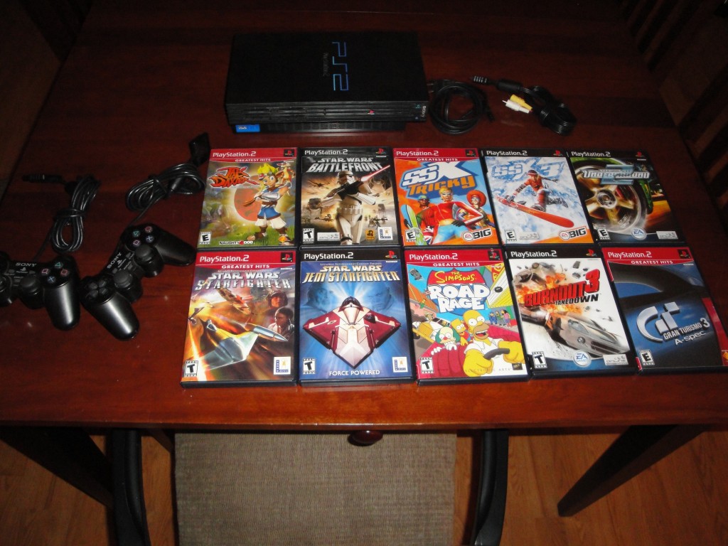For Sale PS2 and 12 Games Watts Family